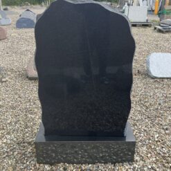 Gravsten i Sort Svensk som Sokkelsten